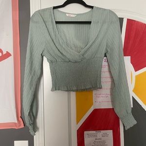 greenish/blue blouse